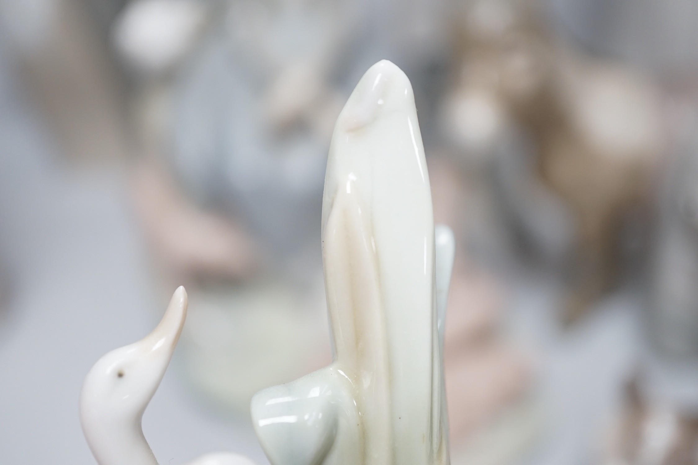 A collection of nine Lladro porcelain figures, tallest 36cm